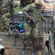 Kenyan Defense Forces arrive at the Westgate Mall in Nairobi, Kenya, where militant attacks occurred. (Simon Maina/Getty Images)